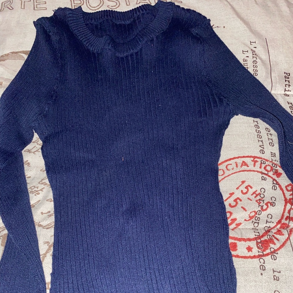 Navy blue sweater.